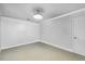 Bedroom with white carpet at 1924 Strebor St, Durham, NC 27705
