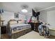 Bedroom with tv on the wall and furnished with a queen bed at 1924 Strebor St, Durham, NC 27705
