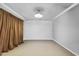 Bedroom with brown curtain at 1924 Strebor St, Durham, NC 27705