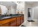 Spacious bathroom featuring a double vanity with granite countertops and modern fixtures at 200 Heather Brook Cir, Spring Lake, NC 28390