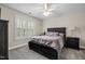 Cozy bedroom with a window and shutters at 200 Heather Brook Cir, Spring Lake, NC 28390
