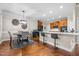 Eat-in kitchen with stainless appliances, breakfast bar, and dining area, perfect for Gathering gatherings and casual meals at 200 Heather Brook Cir, Spring Lake, NC 28390