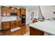 Well-appointed kitchen with wood cabinets, granite countertops, and stainless-steel appliances, designed for culinary enthusiasts at 200 Heather Brook Cir, Spring Lake, NC 28390