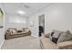 Cozy living room featuring plush seating, neutral walls, and a carpeted floor at 200 Heather Brook Cir, Spring Lake, NC 28390