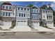 Charming townhomes with individual garages, lovely colors, and inviting curb appeal at 2207 Lambert Rd # 69, Cary, NC 27519