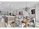 Open-concept living space with a modern kitchen and a dining area, perfect for entertaining at 2207 Lambert Rd # 69, Cary, NC 27519