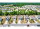 Aerial view showcasing the community with well-maintained homes and lush greenery at 224 Brisk Dr, Zebulon, NC 27597