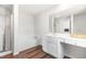 Bright bathroom with a soaking tub, separate shower, and a vanity with ample counter space at 224 Brisk Dr, Zebulon, NC 27597