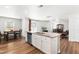 Open-concept kitchen with island and stainless steel appliances overlooking the dining and living areas at 224 Brisk Dr, Zebulon, NC 27597
