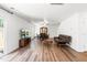 Bright living room with hardwood floors, entertainment center, and ample space for seating at 224 Brisk Dr, Zebulon, NC 27597