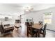 Spacious living room with open floor plan, dining area, and kitchen access at 224 Brisk Dr, Zebulon, NC 27597