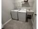 Laundry room with washer, dryer, utility sink, and wire shelving at 2297 Bay Minette Sta # 536, Apex, NC 27502