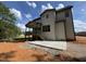 New construction backyard with concrete patio and natural setting at 2408 Eagle Shot Ct # 4, Fuquay Varina, NC 27526