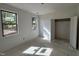 Bright bedroom featuring two windows and closet with natural sunlight at 2408 Eagle Shot Ct # 4, Fuquay Varina, NC 27526