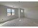 Bright bedroom featuring two windows that fill the room with natural light at 2408 Eagle Shot Ct # 4, Fuquay Varina, NC 27526