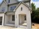 Charming front entrance features painted brick detail, address numbers, and overhead outdoor lighting at 2408 Eagle Shot Ct # 4, Fuquay Varina, NC 27526