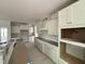 Spacious kitchen showcasing white cabinets, modern appliances, and ample counter space at 2408 Eagle Shot Ct # 4, Fuquay Varina, NC 27526