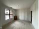 Bright room featuring white trim and a large window offering pleasant views at 2408 Eagle Shot Ct # 4, Fuquay Varina, NC 27526