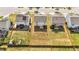 Aerial view of a home with a spacious, fenced backyard on a sunny day at 2522 Dalmahoy Ln, Fuquay Varina, NC 27526
