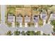 Aerial view of houses, showcasing the lawns, driveways, and street at 2522 Dalmahoy Ln, Fuquay Varina, NC 27526