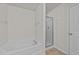 Bathroom with separate tub and shower showcasing modern fixtures and a private toilet at 2522 Dalmahoy Ln, Fuquay Varina, NC 27526