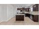 Inviting kitchen with a central island and stainless steel appliances at 2522 Dalmahoy Ln, Fuquay Varina, NC 27526