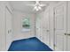 Bedroom featuring a window, storage closet, and ceiling fan lighting at 2608 Foxgate Dr, Raleigh, NC 27610
