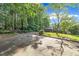 Residential property featuring a long driveway and lush surroundings at 2608 Foxgate Dr, Raleigh, NC 27610