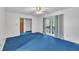 View of the interior with a large window providing natural light at 2608 Foxgate Dr, Raleigh, NC 27610