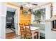 Charming breakfast nook with a sunny yellow wall and a view to the adjoining dining room at 302 Villa St, Rocky Mount, NC 27804