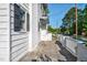 Exterior shot showcasing the side of the home with a concrete walkway at 302 Villa St, Rocky Mount, NC 27804