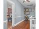 Upstairs hallway with wood floors at 302 Villa St, Rocky Mount, NC 27804