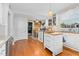 Bright kitchen view that looks into a cozy dining area and the home office at 302 Villa St, Rocky Mount, NC 27804