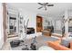 Spacious living room with a fireplace and access to the adjoining areas of the home at 302 Villa St, Rocky Mount, NC 27804