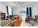 Living room with a comfortable chair and fireplace at 302 Villa St, Rocky Mount, NC 27804