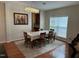 Dining room with hardwood floors, natural light, and space for entertaining at 3032 Kilarney Ridge Loop, Cary, NC 27511