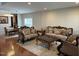 Formal living room with hardwood floors, elegant furnishings, and a neutral color palette at 3032 Kilarney Ridge Loop, Cary, NC 27511