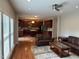 Open-concept living space with kitchen, seating area, and ample natural light at 3032 Kilarney Ridge Loop, Cary, NC 27511