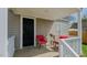 Inviting front porch with comfortable seating, perfect for relaxing and enjoying the outdoors at 311 Oakley St, Graham, NC 27253