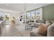 Open-concept living space with stylish furnishings, modern decor, and abundant natural light at 32 Honeydew Way, Clayton, NC 27520