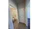 Bathroom view showcasing a tub and shower combo with tile flooring, a toilet, and modern fixtures at 322 Deodora Ln, Cameron, NC 28326