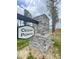Stone sign for Cedar Pointe, a newly developed community with lush greenery and peaceful surroundings at 322 Deodora Ln, Cameron, NC 28326