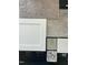 Showcasing the Harrison Plank flooring, Frost White cabinets, and Ashen White granite at 322 Deodora Ln, Cameron, NC 28326