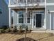 View of the front door and porch, framed by fresh landscaping at 33 Brooklynn Trail # 181, Angier, NC 27501