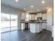 Modern kitchen with stainless steel appliances, center island, and stylish finishes at 33 Brooklynn Trail # 181, Angier, NC 27501