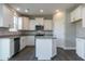 Well-equipped kitchen with modern appliances and a convenient center island at 33 Brooklynn Trail # 181, Angier, NC 27501