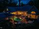 Aerial view of home highlighting backyard pool, spa, outdoor seating areas, outdoor bar and covered lounge areas at 403 Granville Rd, Chapel Hill, NC 27514