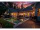Gorgeous backyard pool and spa with ample patio seating and a built-in grill and bar at 403 Granville Rd, Chapel Hill, NC 27514