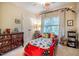 bedroom with car bed, a basketball hoop, and playful decor at 403 Granville Rd, Chapel Hill, NC 27514