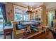 Cozy breakfast nook with built-in seating, shelving, and large window for natural light at 403 Granville Rd, Chapel Hill, NC 27514